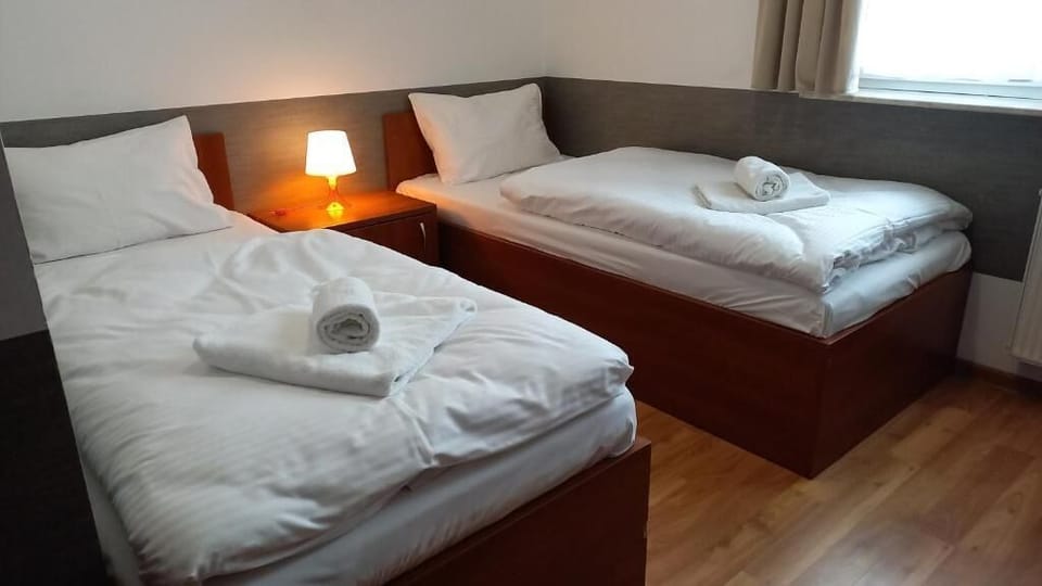 Desk, laptop workspace, WiFi (free), bed sheets
