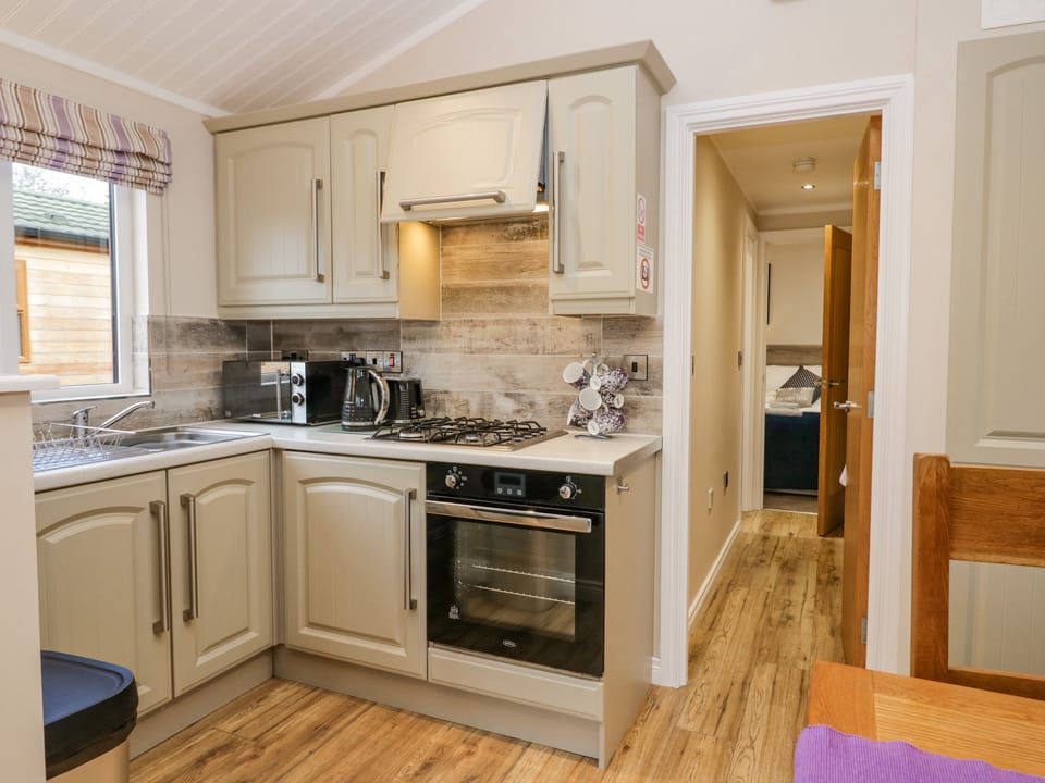 Fridge, electric kettle, toaster, cookware/dishes/utensils