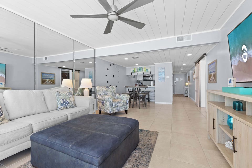 Condo, 1 King Bed with Sofa bed, Kitchen, Ocean View (Beachfront Days) | Living area | 50-inch flat-screen TV with digital channels