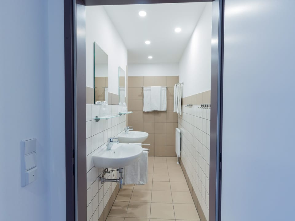 Basic Quadruple Room | Bathroom | Shower, hair dryer, towels, soap