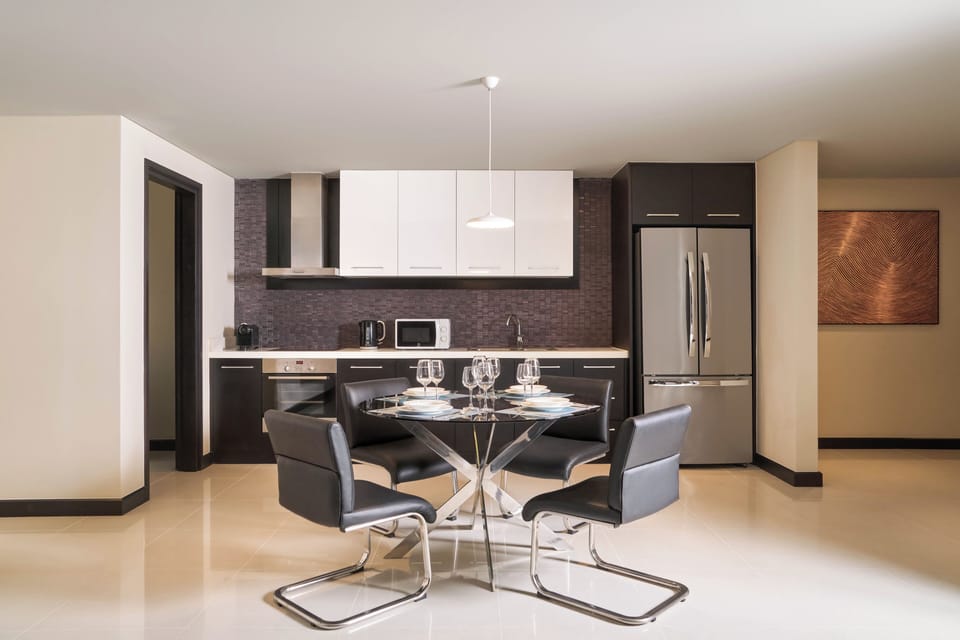 Suite, 2 Bedrooms, Ocean View (Horizon, 1 King, 2 Twin Beds) | Private kitchen | Fridge, microwave, oven, electric kettle