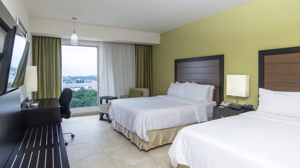 Standard Room, 2 Queen Beds, City View | Down comforters, in-room safe, desk, blackout drapes