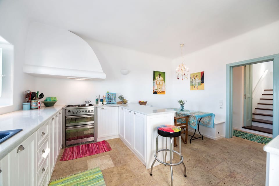 Villa | Private kitchen | Fridge, microwave, oven, stovetop