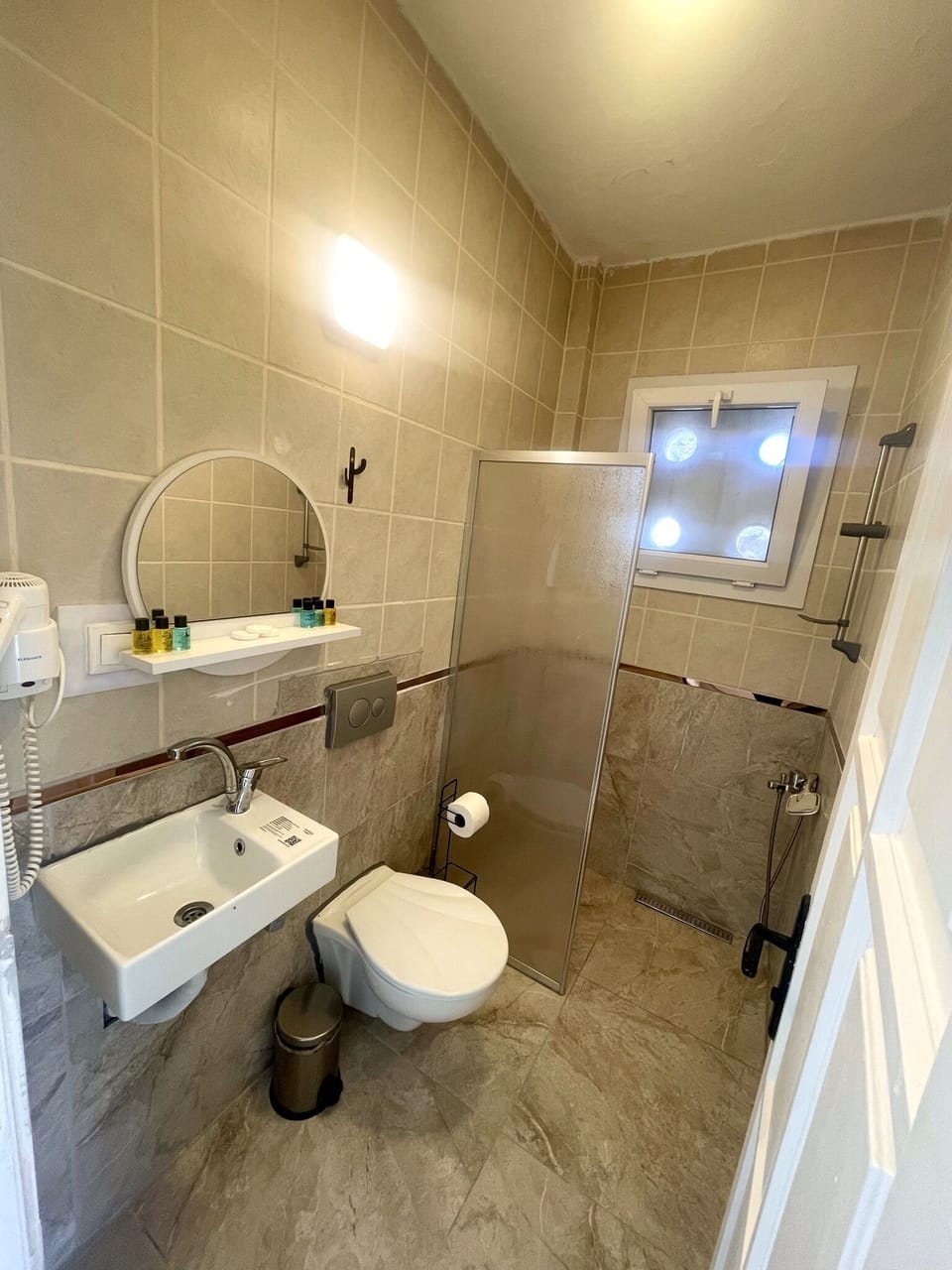 Standard Double Room | Bathroom | Shower, hair dryer, slippers, towels