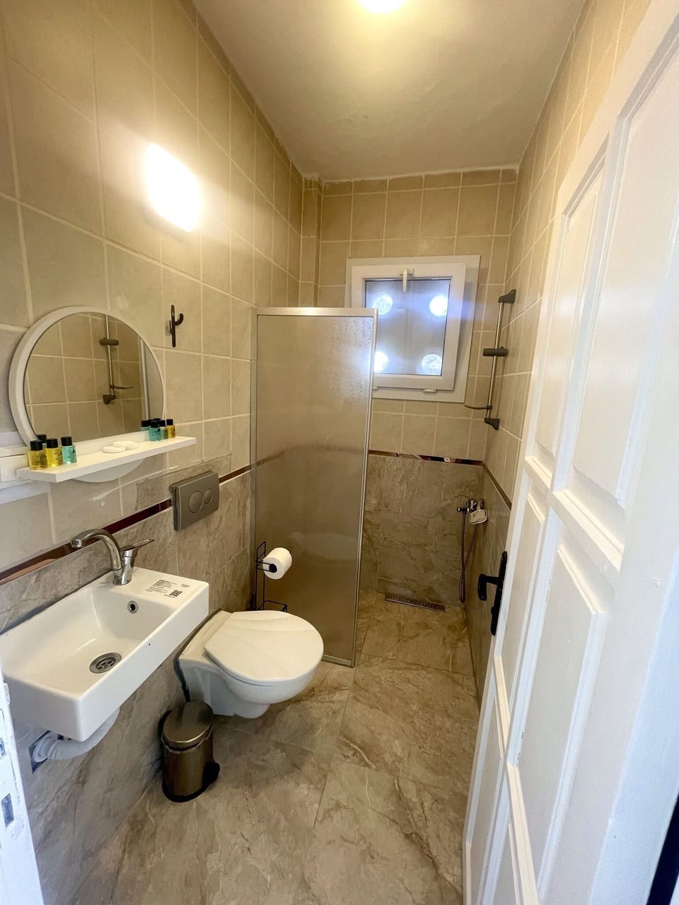 Standard Double Room | Bathroom | Shower, hair dryer, slippers, towels