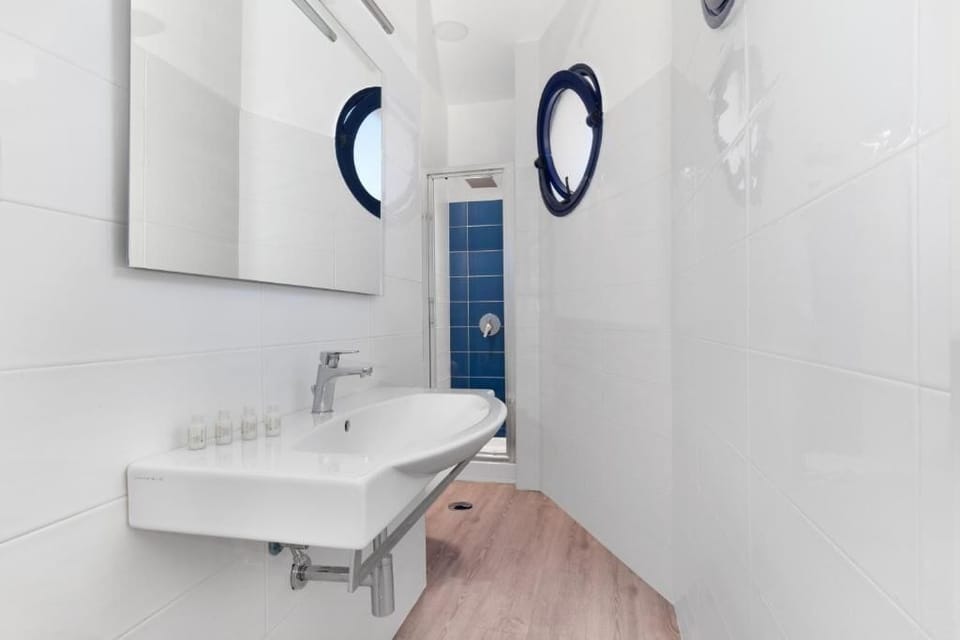 Standard Double or Twin Room | Bathroom | Shower, rainfall showerhead, eco-friendly toiletries, hair dryer