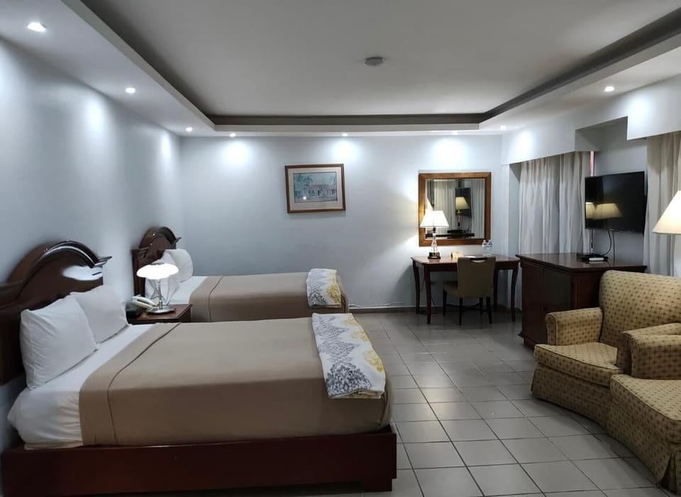 Standard Room, 2 Queen Beds | Pillowtop beds, in-room safe, desk, WiFi (free)