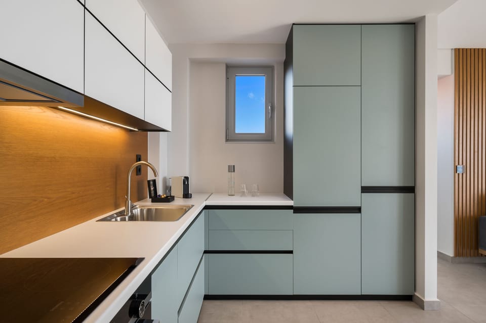 Deluxe Apartment | Private kitchen | Mini-fridge, stovetop, espresso maker, coffee/tea maker