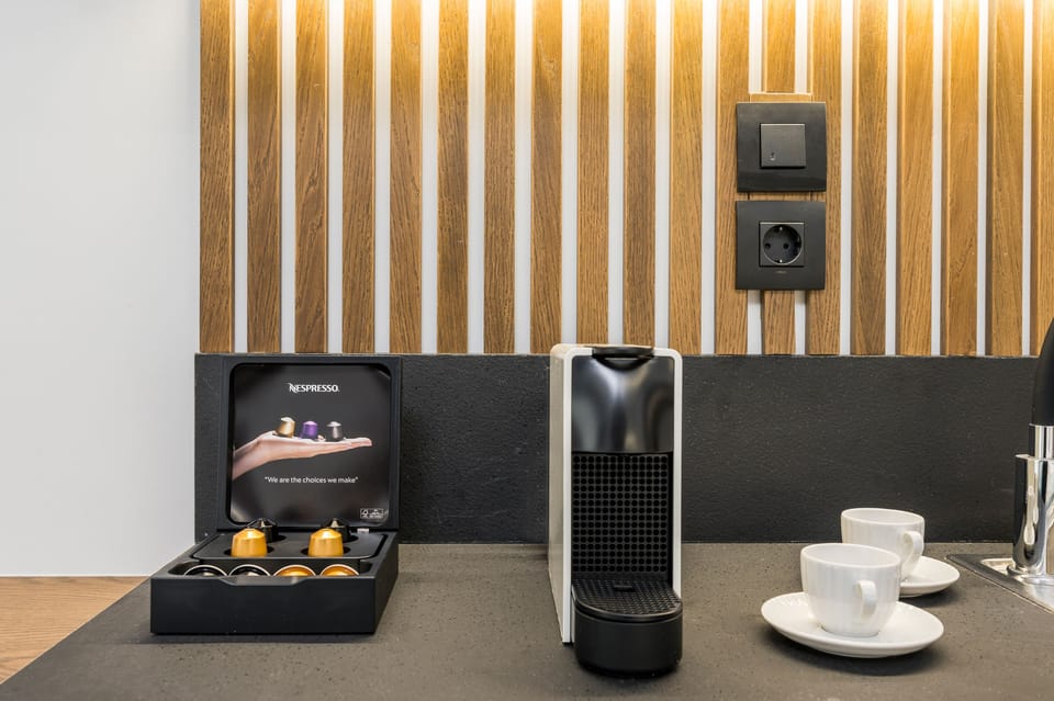 Mini-fridge, stovetop, espresso maker, coffee/tea maker