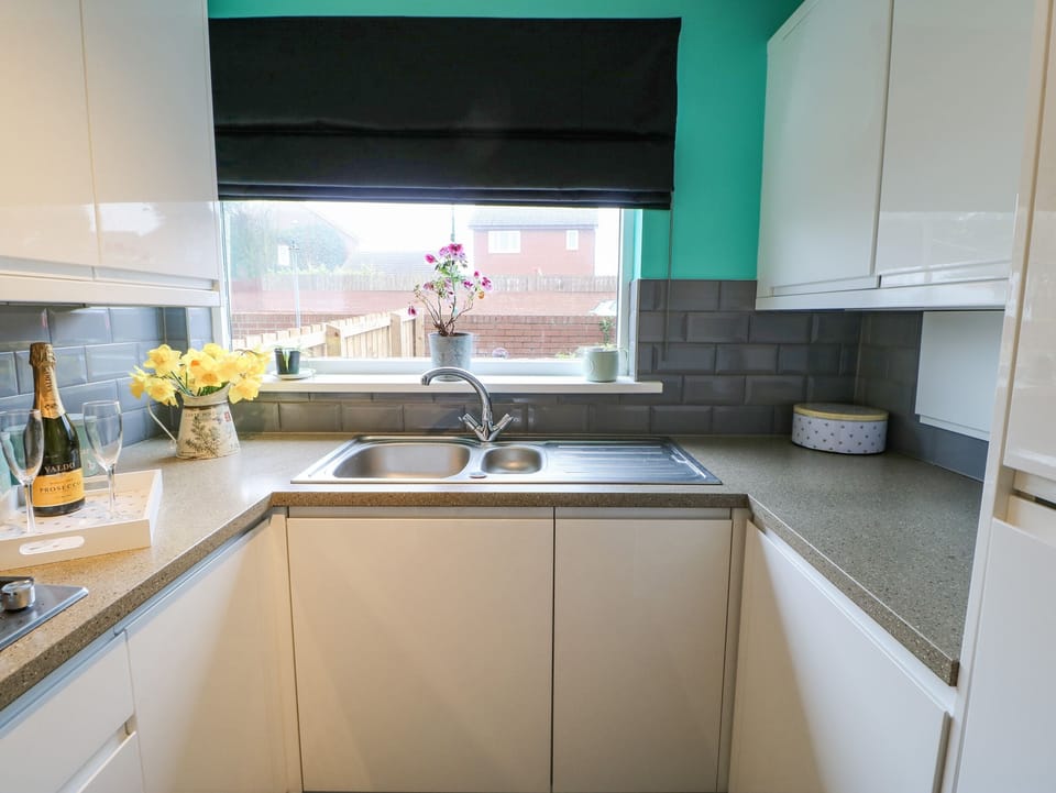 Fridge, dishwasher, electric kettle, toaster