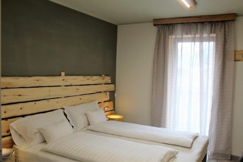 Comfort Double or Twin Room | Down comforters, free WiFi, bed sheets, wheelchair access