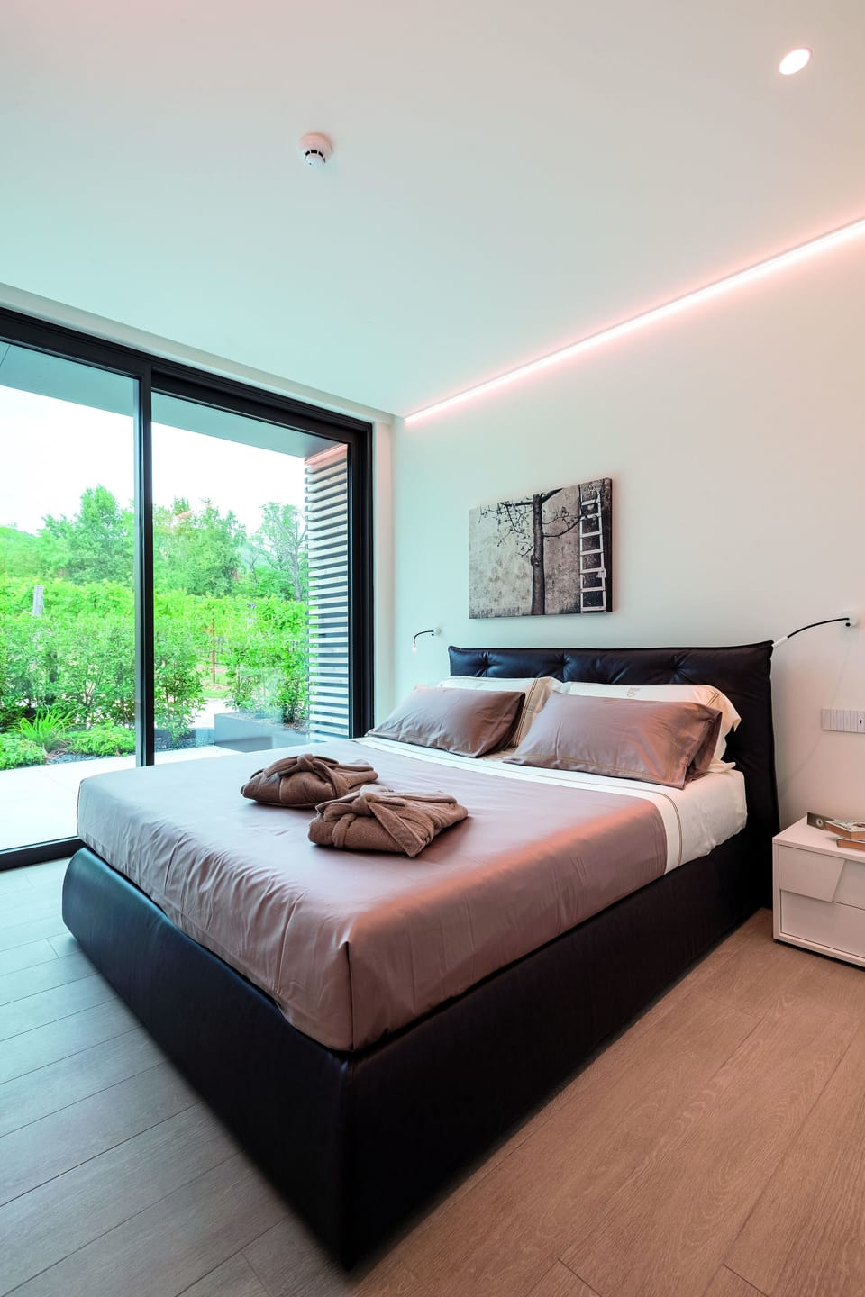 Luxury Condo | Premium bedding, down comforters, minibar, in-room safe