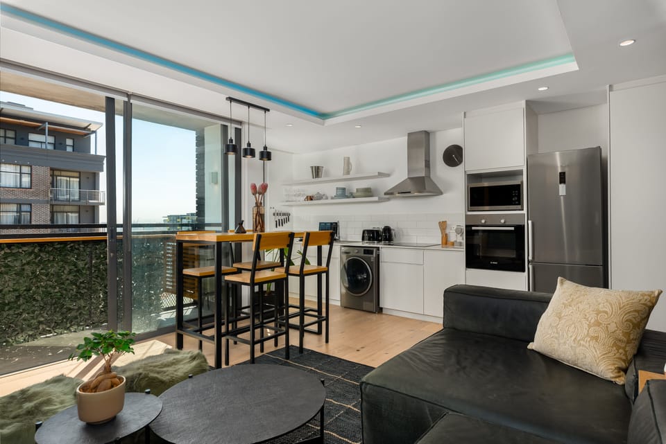 Design Apartment | Living area | 50-inch flat-screen TV with cable channels, TV, streaming services