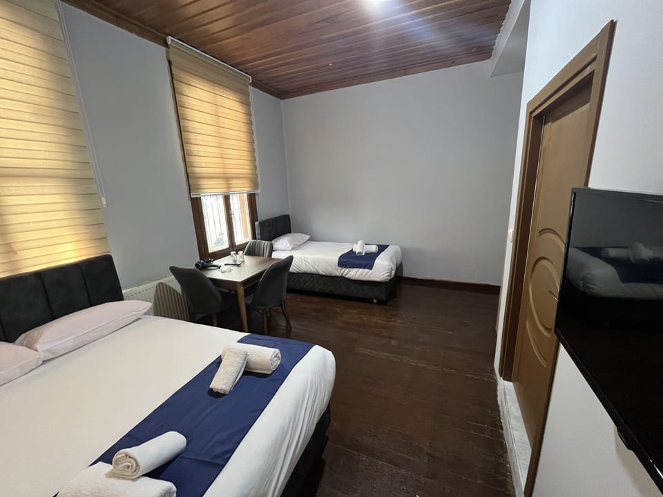 Family Triple Room | Egyptian cotton sheets, premium bedding, soundproofing, free WiFi