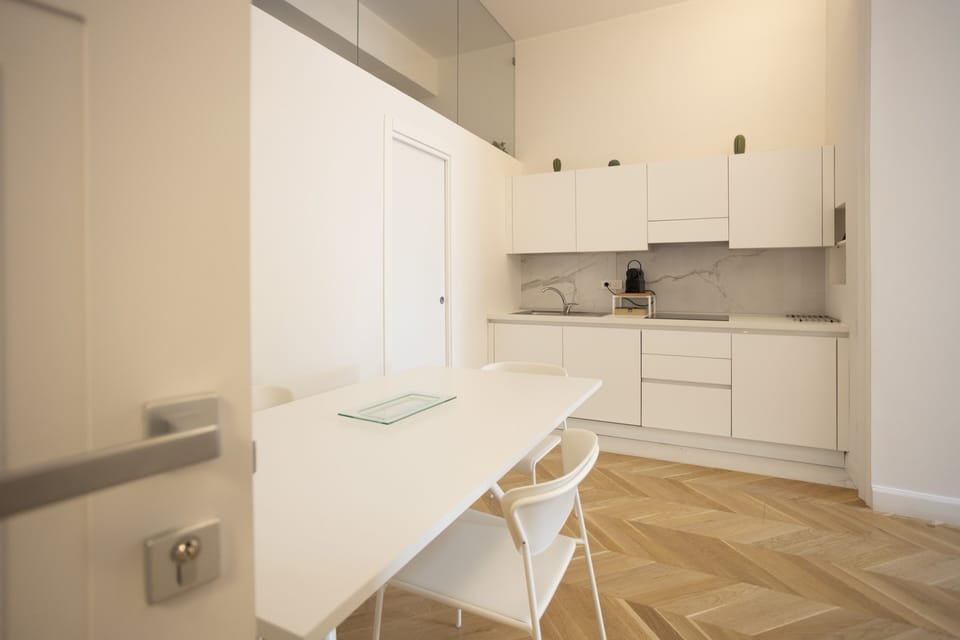 Deluxe Apartment | Private kitchen | Full-size fridge, oven, stovetop, espresso maker