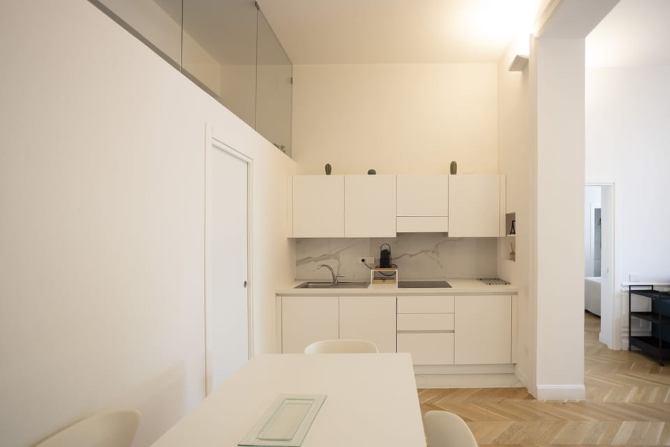 Deluxe Apartment | Private kitchen | Full-size fridge, oven, stovetop, espresso maker