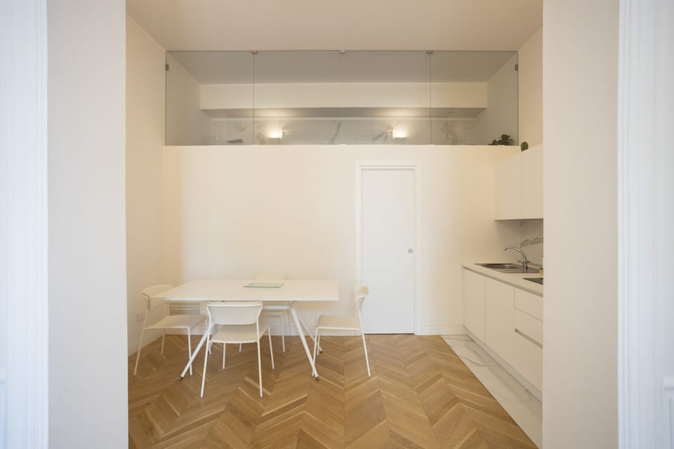 Deluxe Apartment | Private kitchen | Full-size fridge, oven, stovetop, espresso maker