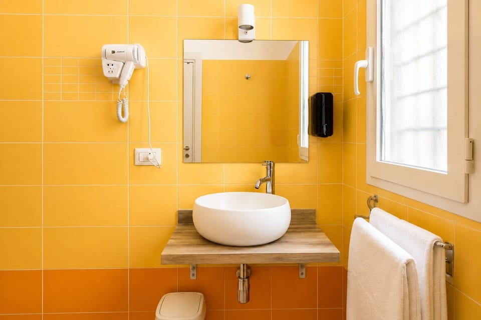 Classic Double Room | Bathroom | Shower, hair dryer, towels, soap
