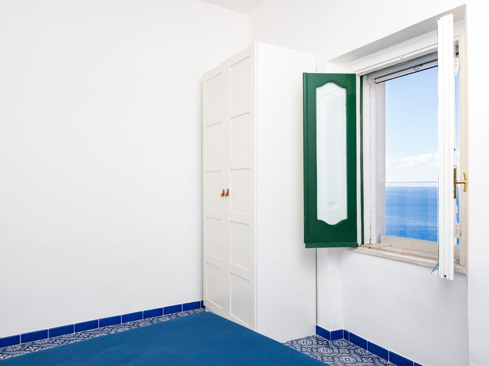 Panoramic House | 3 bedrooms, down comforters, in-room safe, iron/ironing board