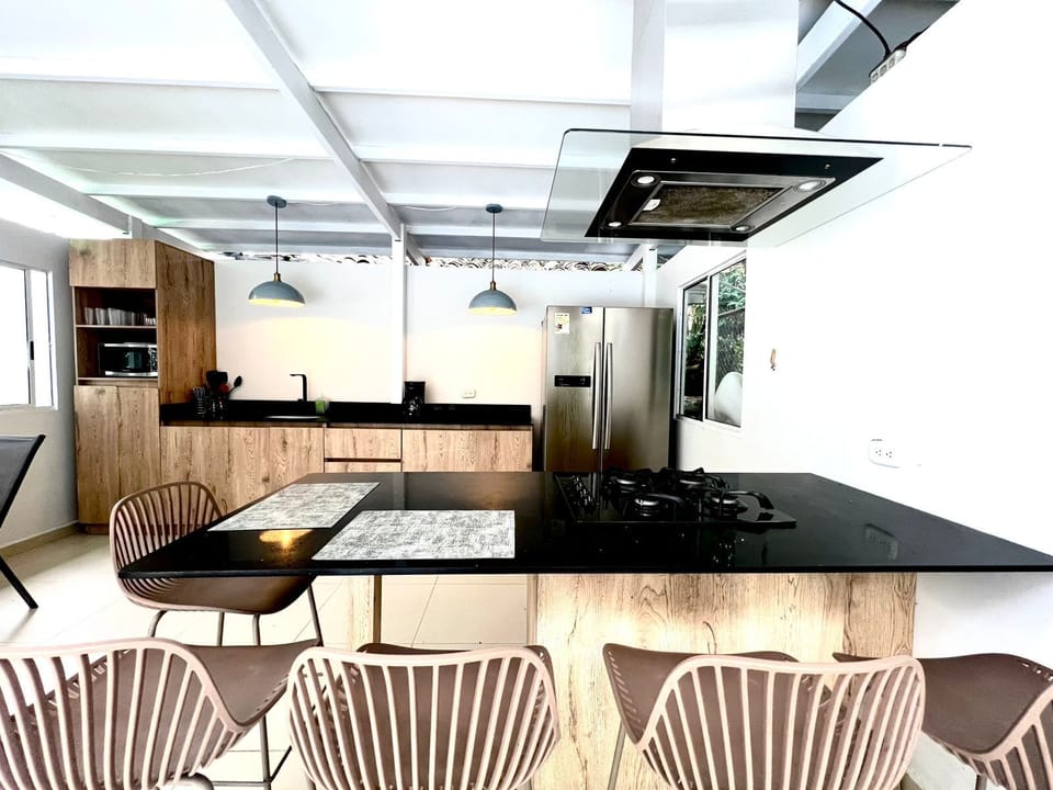Villa | Private kitchen | Full-size fridge, microwave, coffee/tea maker, blender