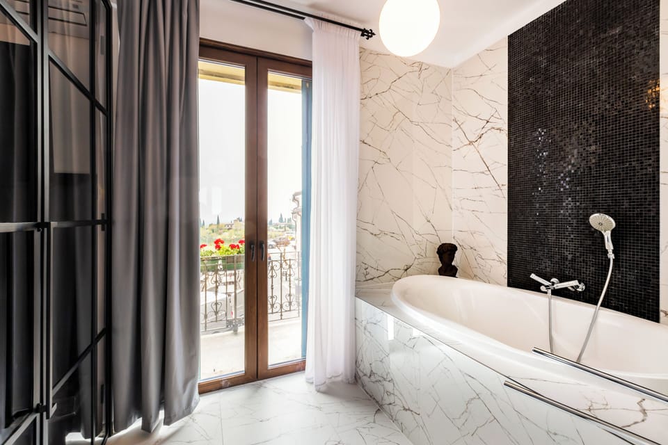 Junior Suite, Balcony | Bathroom | Hair dryer, slippers, bidet, towels