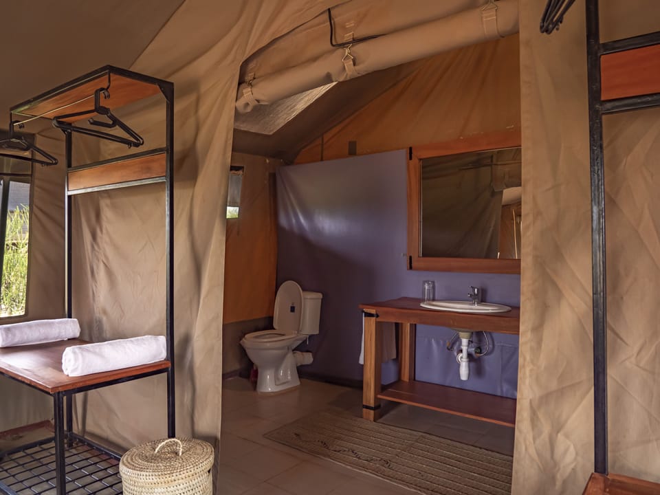 Standard Tent | Bathroom | Shower, rainfall showerhead, bathrobes, slippers