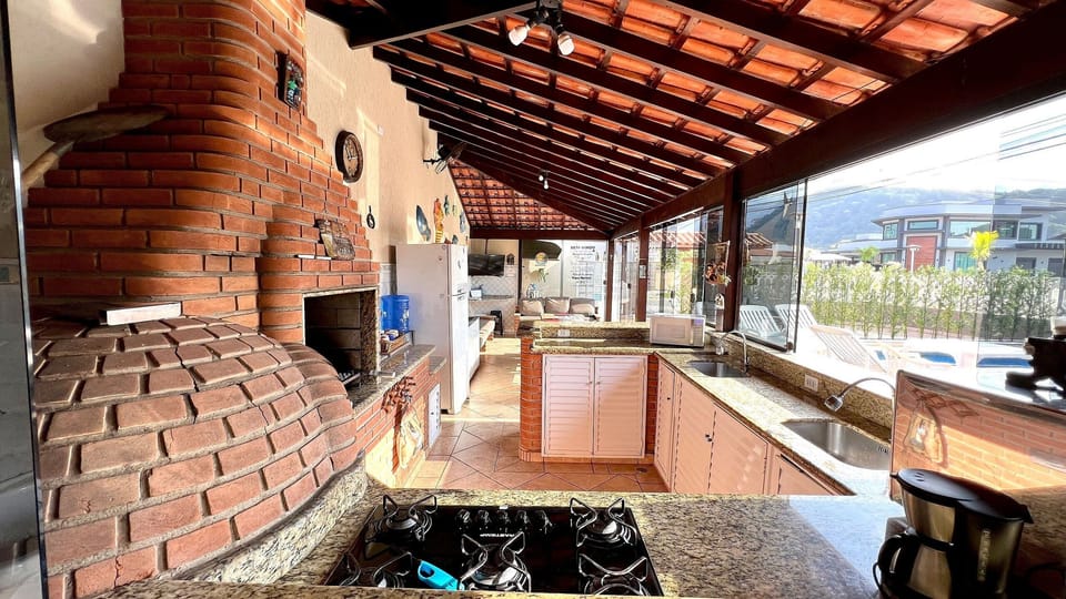 Villa | Private kitchen | Full-size fridge, microwave, oven, stovetop