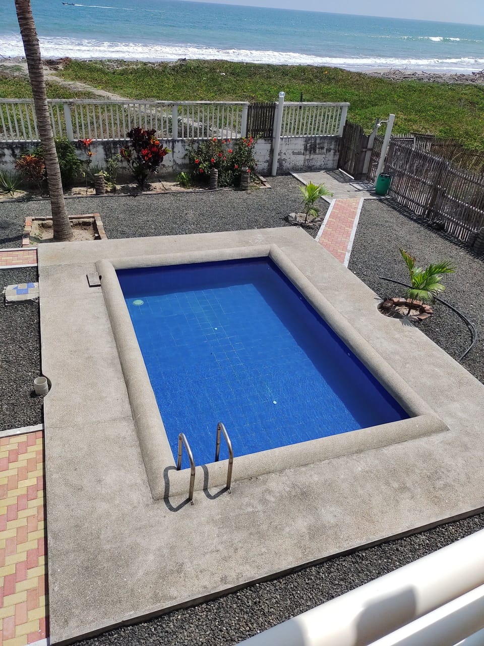 Outdoor pool, open 7:00 AM to 7:00 PM, sun loungers