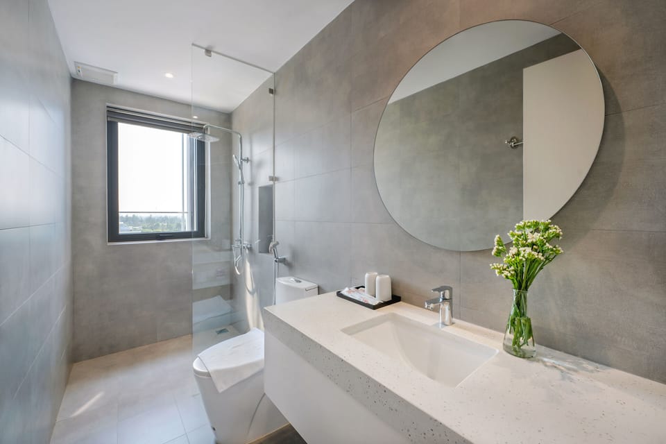 Shower, rainfall showerhead, designer toiletries, hair dryer