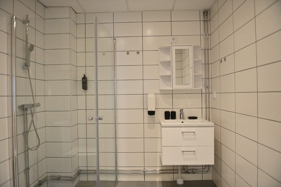 Deluxe Suite | Bathroom | Heated floors, towels
