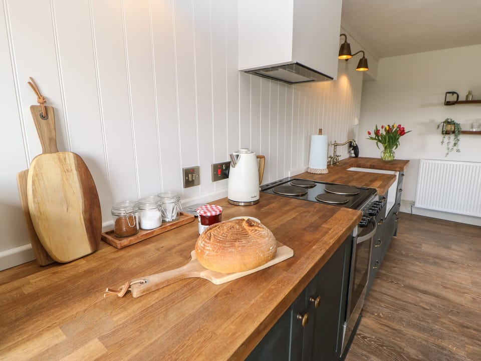 Fridge, electric kettle, toaster, cookware/dishes/utensils