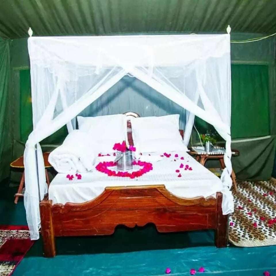 Luxury Tent | In-room safe, individually decorated, desk, blackout drapes