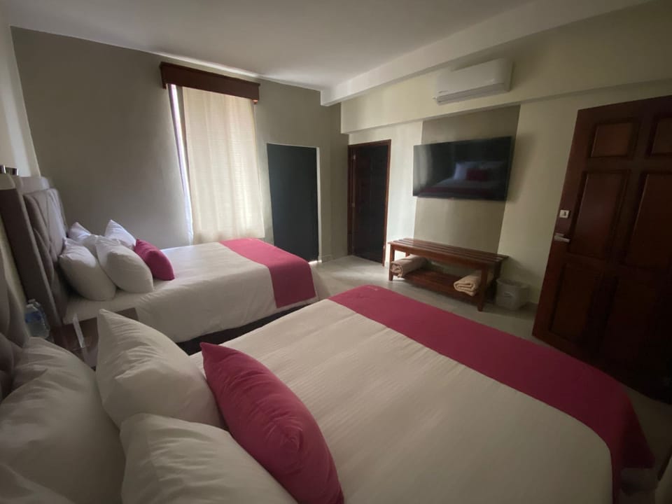Deluxe Double Room, 2 Queen Beds | Blackout drapes, iron/ironing board (on request), WiFi (free)