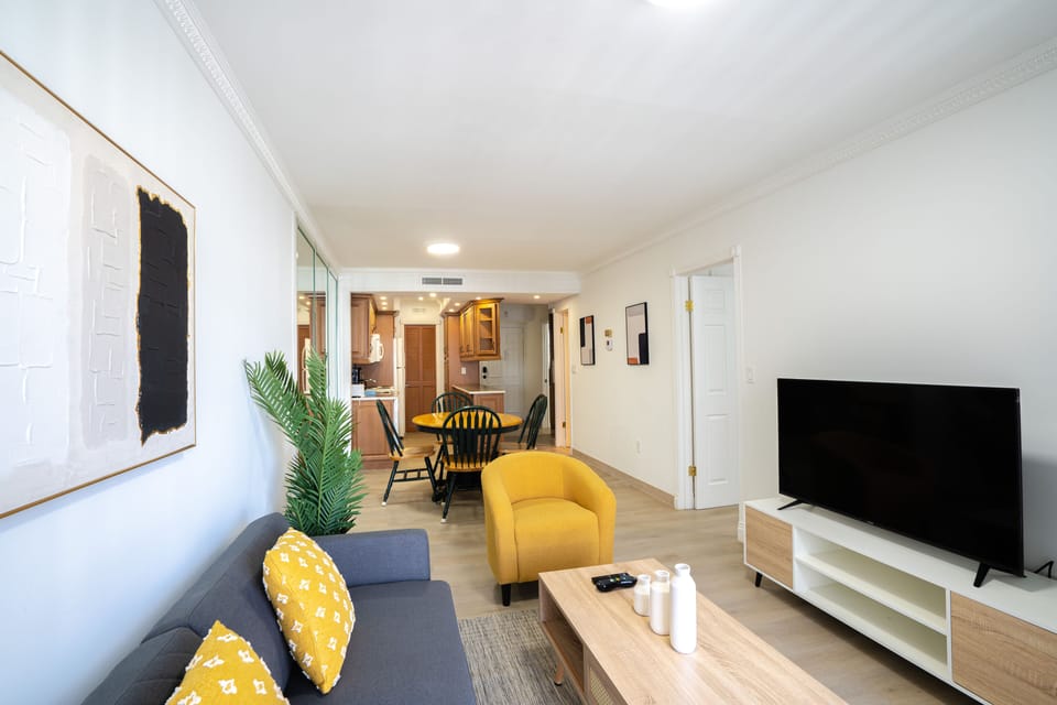 Family Apartment | Living area | 1-cm flat-screen TV with digital channels