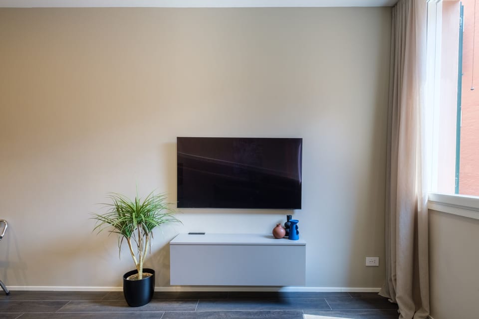 Apartment | Living area | 55-inch Smart TV with satellite channels, TV