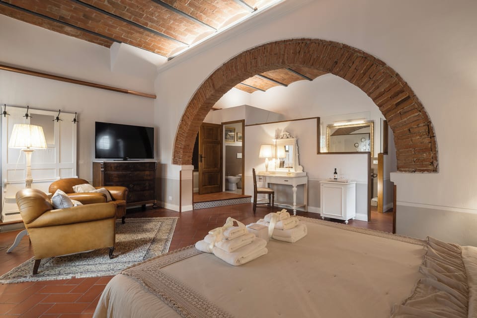 Suite, 1 Double Bed | Minibar, in-room safe, desk, free WiFi