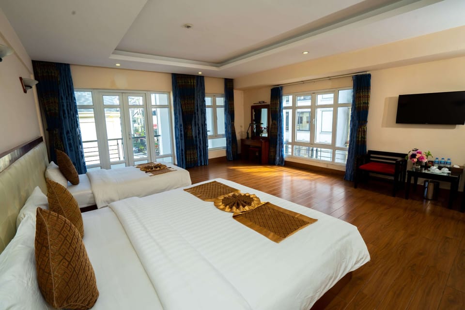 Deluxe Triple Room | Desk, free WiFi