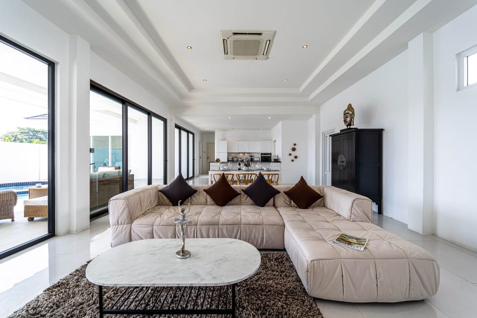 Villa | Living area | 40-inch LED TV with cable channels, TV