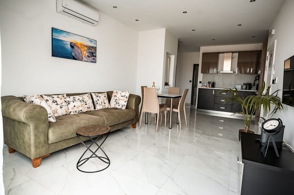 Luxury Apartment | Living area | 42-inch LED TV with digital channels, TV