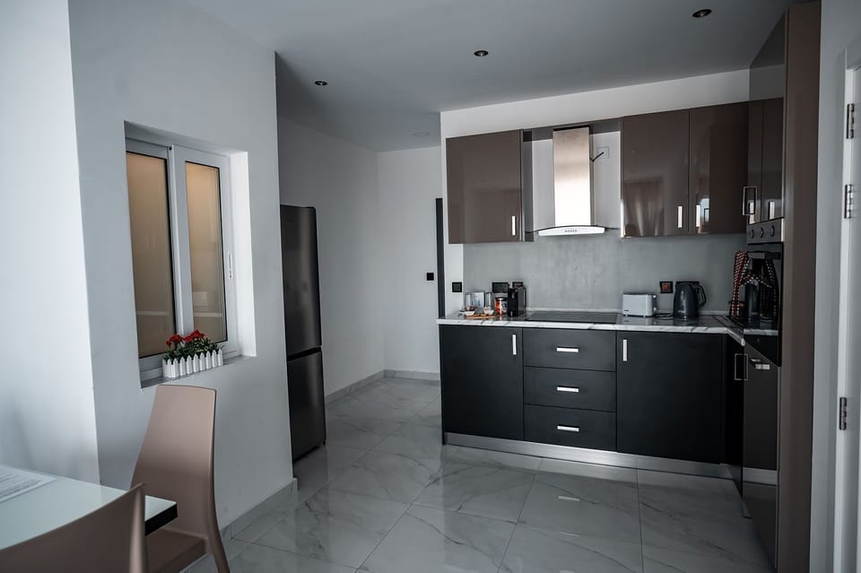 Luxury Apartment | Living area | 42-inch LED TV with digital channels, TV
