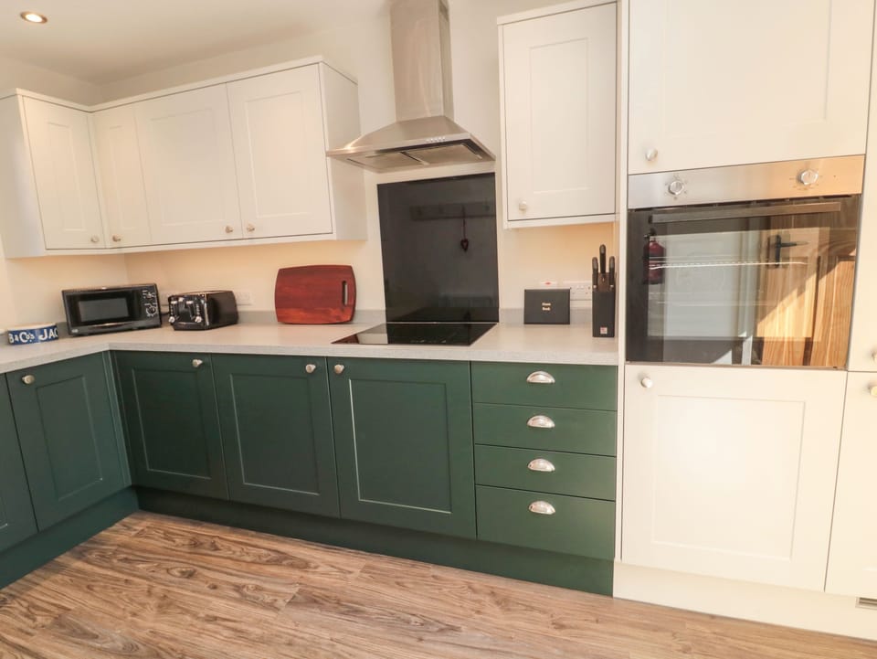 Fridge, electric kettle, toaster, cookware/dishes/utensils