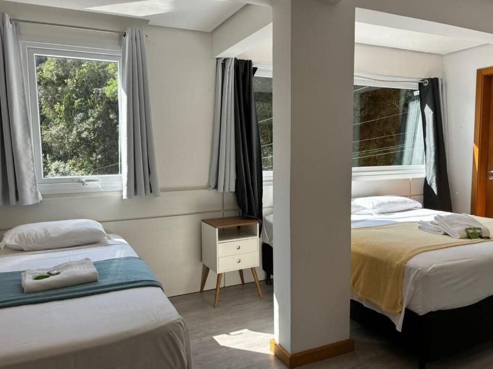 Deluxe Quadruple Room | Soundproofing, WiFi (free), bed sheets