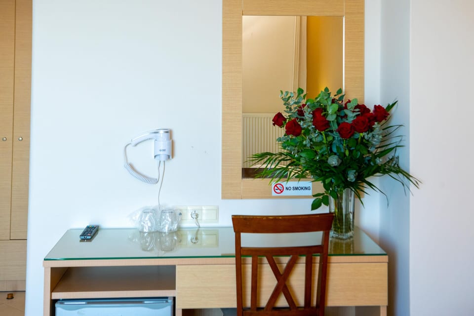 Standard Room, Sea View | In-room safe, blackout drapes, iron/ironing board