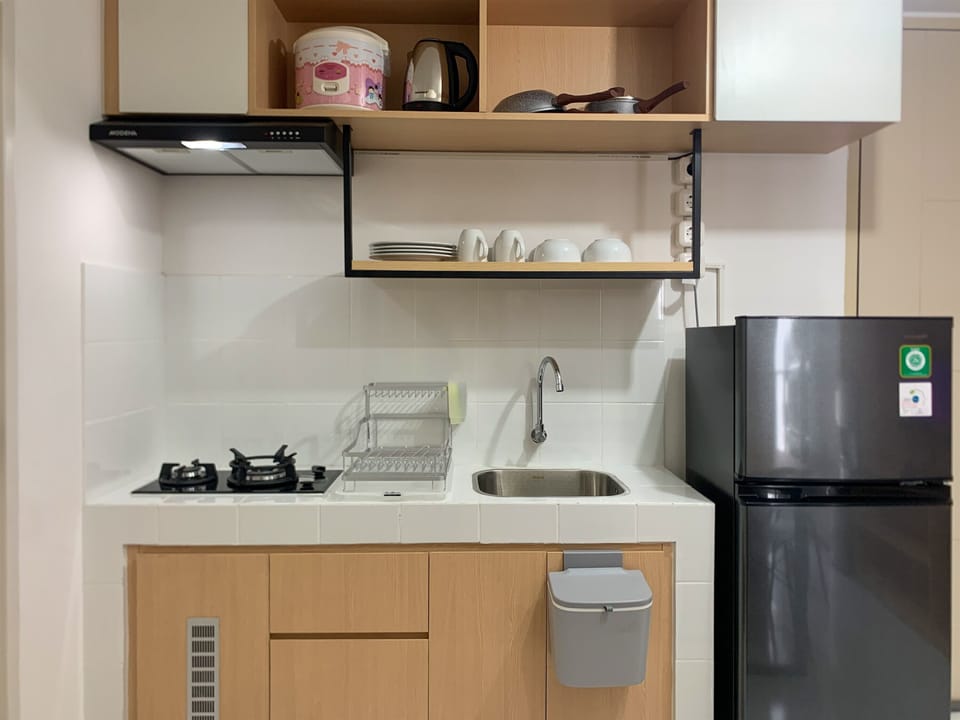 Apartment, 2 Bedrooms | Private kitchen | Full-size fridge, stovetop