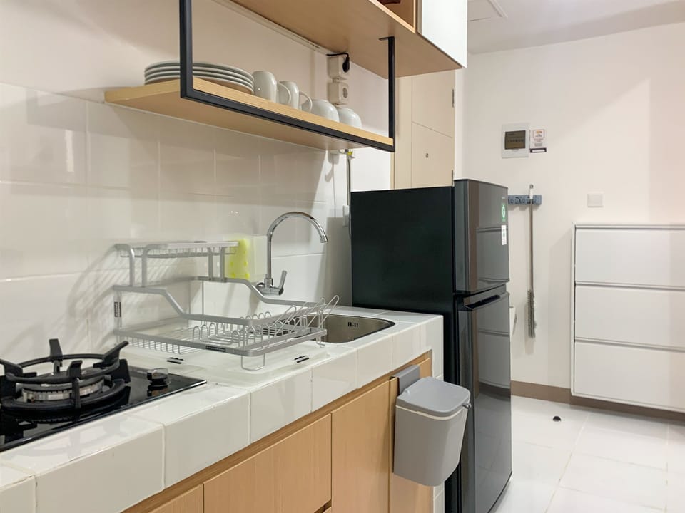 Apartment, 2 Bedrooms | Private kitchen | Full-size fridge, stovetop