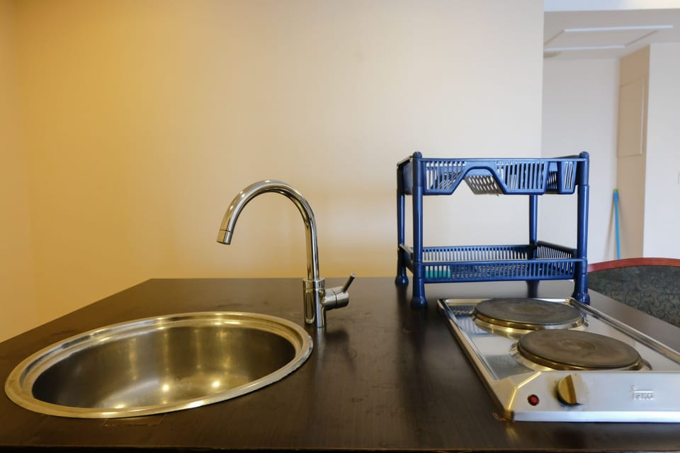 Apartment, 2 Bedrooms | Private kitchen | Full-size fridge, stovetop, electric kettle