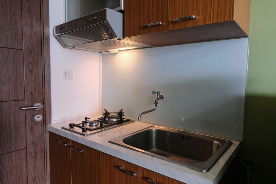 Apartment | Private kitchen | Full-size fridge, stovetop