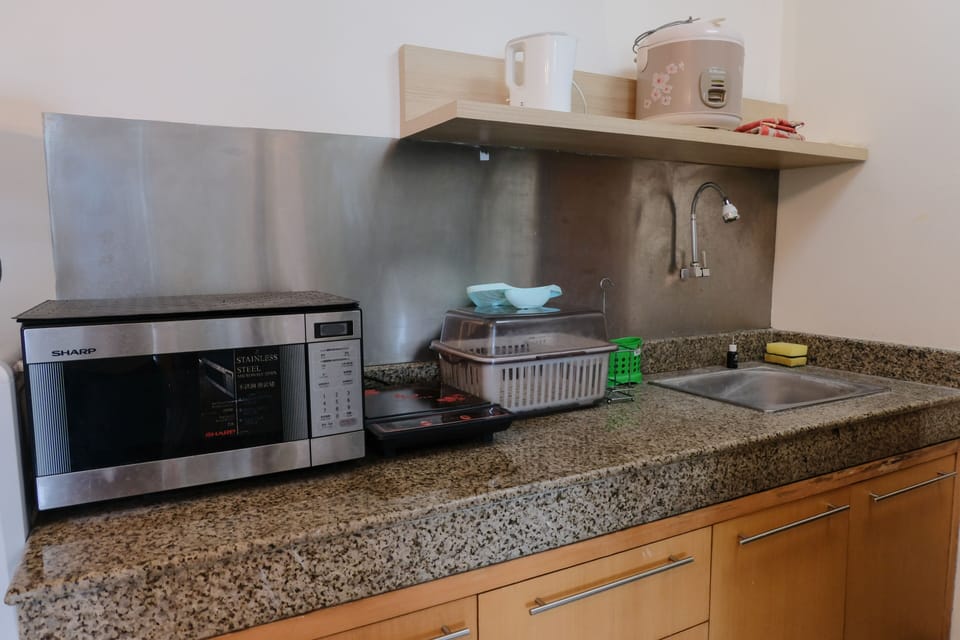 Apartment, 2 Bedrooms | Private kitchen | Full-size fridge, stovetop