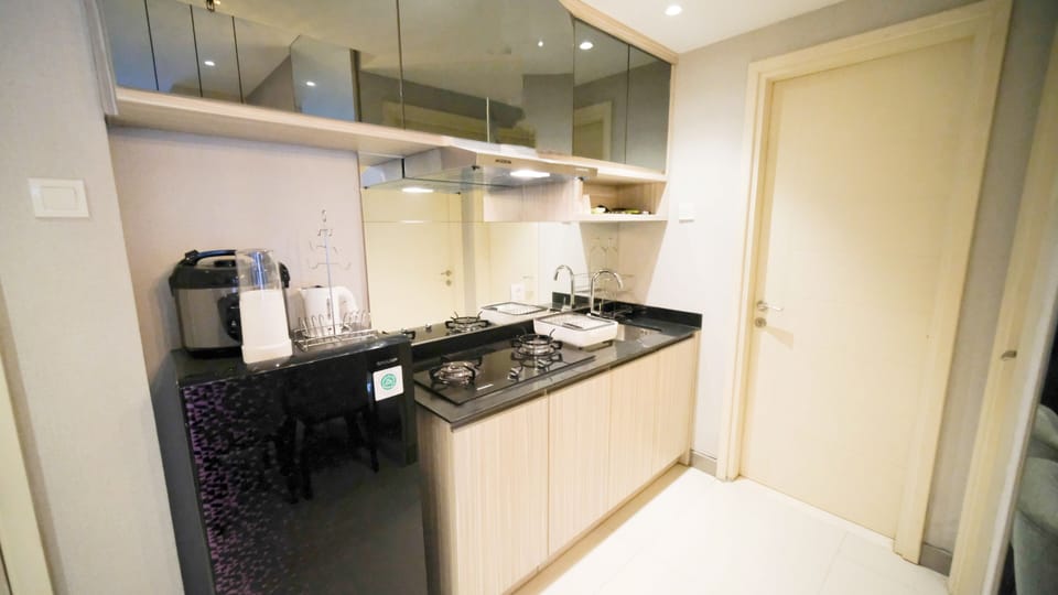 Apartment, 2 Bedrooms | Private kitchen | Full-size fridge, stovetop