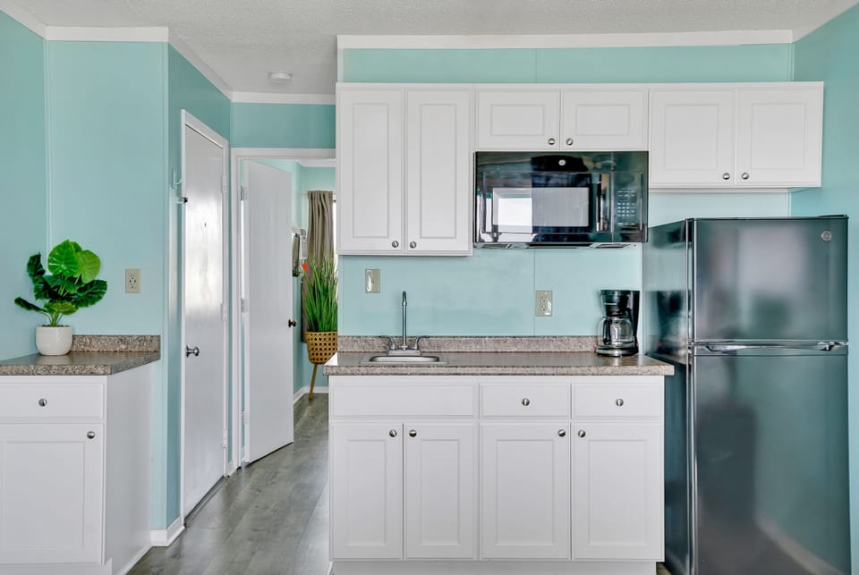 Fridge, microwave, coffee/tea maker, paper towels